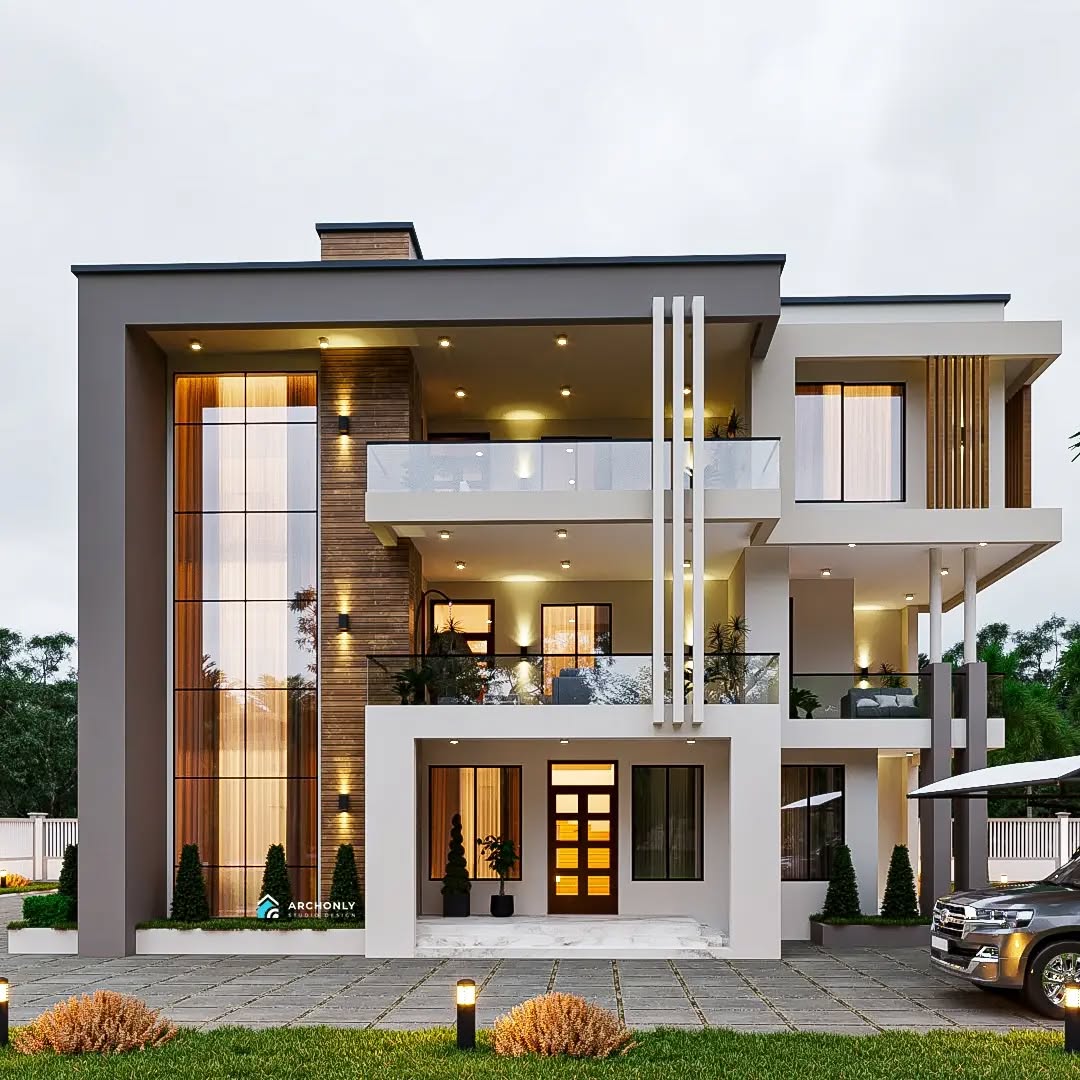 Contemporary residence with a warm, lit entrance and clean architectural lines